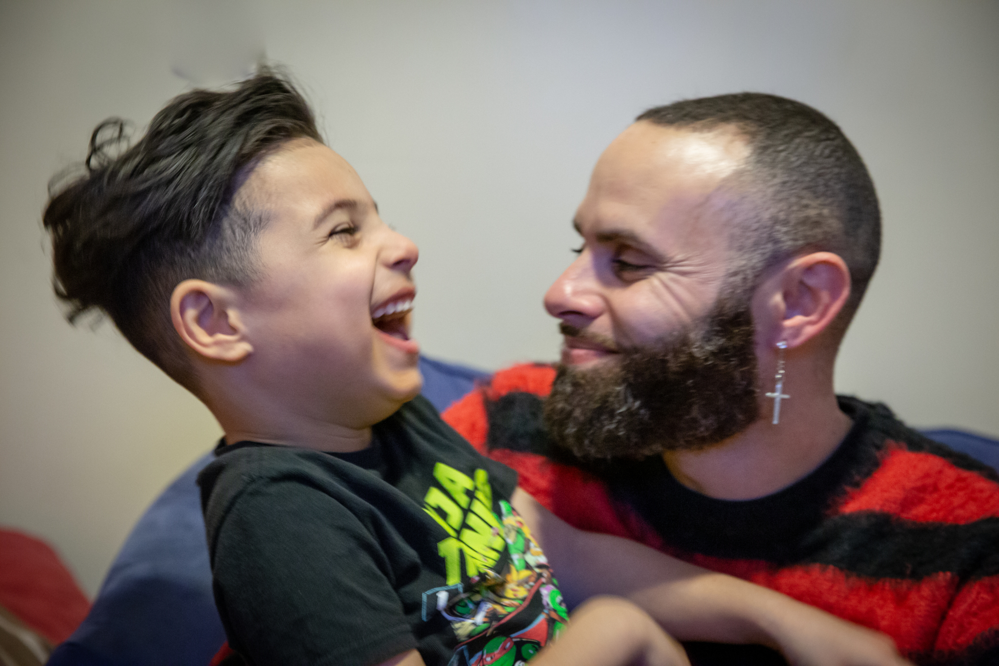 Father and son who live in a home owned by Amos House as part of their Fatherhood Program.