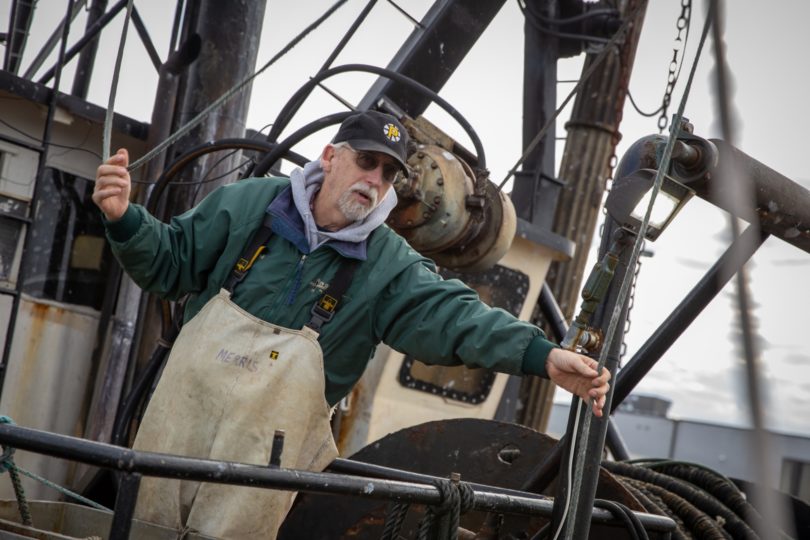 Fisherman on his boat